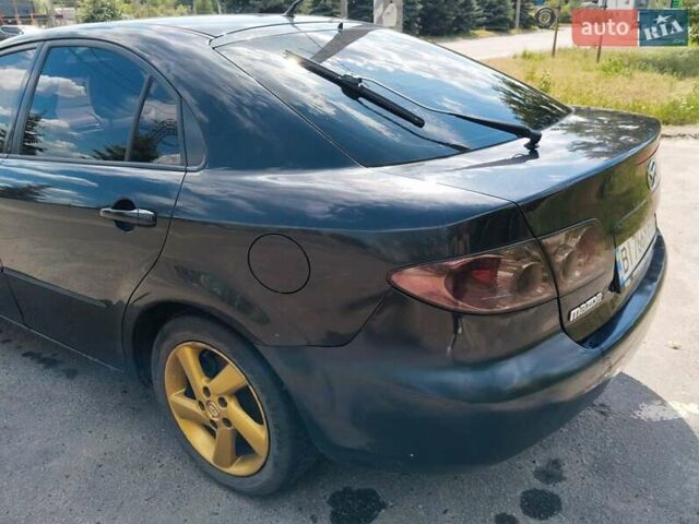 Чорний Мазда 6, об'ємом двигуна 2 л та пробігом 316 тис. км за 4700 $, фото 4 на Automoto.ua
