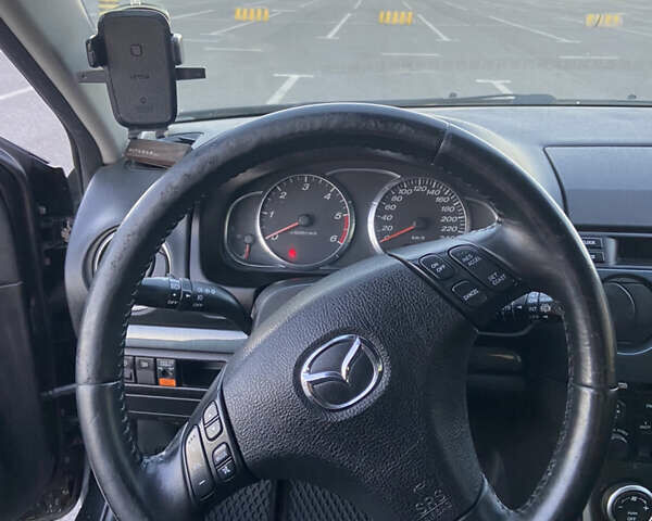 Черный Мазда 6, объемом двигателя 2 л и пробегом 285 тыс. км за 3900 $, фото 7 на Automoto.ua