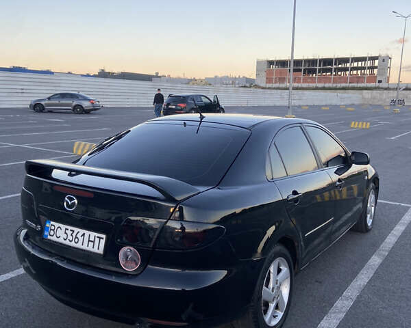 Черный Мазда 6, объемом двигателя 2 л и пробегом 285 тыс. км за 3900 $, фото 2 на Automoto.ua