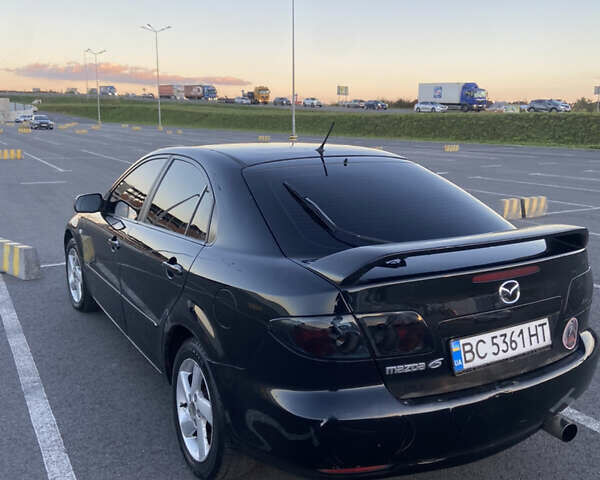 Черный Мазда 6, объемом двигателя 2 л и пробегом 285 тыс. км за 3900 $, фото 3 на Automoto.ua