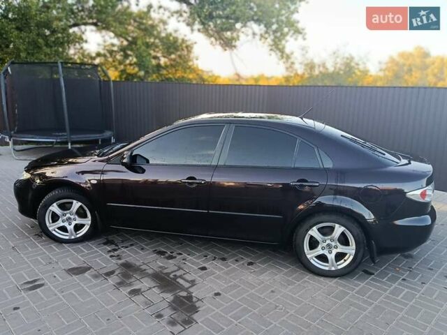 Черный Мазда 6, объемом двигателя 2 л и пробегом 222 тыс. км за 4800 $, фото 1 на Automoto.ua