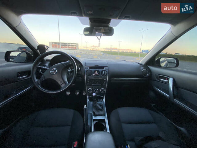 Черный Мазда 6, объемом двигателя 2 л и пробегом 285 тыс. км за 3900 $, фото 6 на Automoto.ua