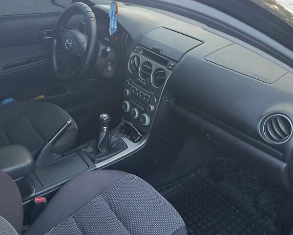 Черный Мазда 6, объемом двигателя 2 л и пробегом 222 тыс. км за 4800 $, фото 4 на Automoto.ua