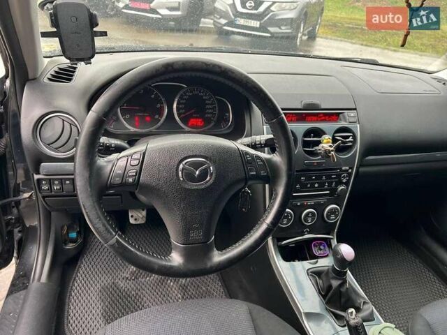 Чорний Мазда 6, об'ємом двигуна 2 л та пробігом 285 тис. км за 3240 $, фото 17 на Automoto.ua