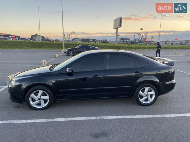 Черный Мазда 6, объемом двигателя 2 л и пробегом 285 тыс. км за 3900 $, фото 5 на Automoto.ua