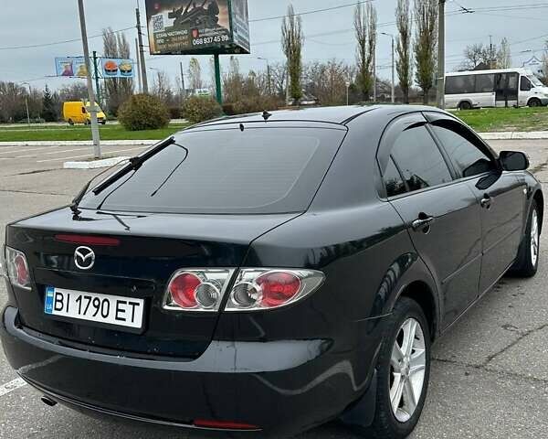 Черный Мазда 6, объемом двигателя 2 л и пробегом 238 тыс. км за 3500 $, фото 5 на Automoto.ua