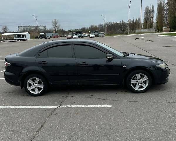 Черный Мазда 6, объемом двигателя 2 л и пробегом 238 тыс. км за 4300 $, фото 2 на Automoto.ua