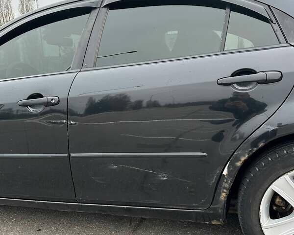 Черный Мазда 6, объемом двигателя 2 л и пробегом 238 тыс. км за 4300 $, фото 11 на Automoto.ua