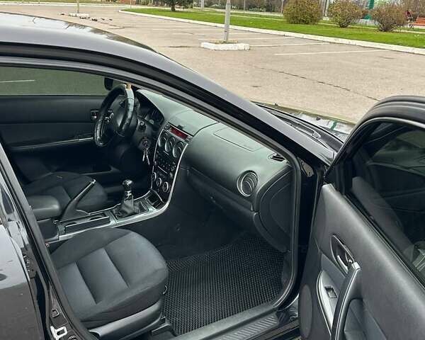 Черный Мазда 6, объемом двигателя 2 л и пробегом 238 тыс. км за 3500 $, фото 12 на Automoto.ua