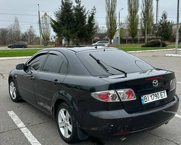 Черный Мазда 6, объемом двигателя 2 л и пробегом 238 тыс. км за 4300 $, фото 3 на Automoto.ua