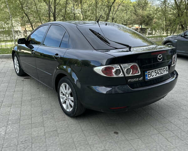 Чорний Мазда 6, об'ємом двигуна 1.8 л та пробігом 202 тис. км за 5500 $, фото 5 на Automoto.ua