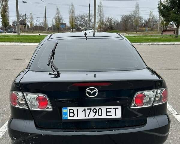 Черный Мазда 6, объемом двигателя 2 л и пробегом 238 тыс. км за 4300 $, фото 4 на Automoto.ua