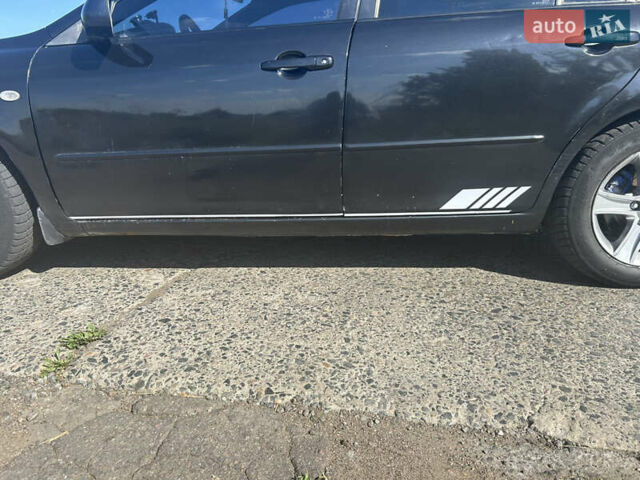 Чорний Мазда 6, об'ємом двигуна 2 л та пробігом 366 тис. км за 3800 $, фото 5 на Automoto.ua