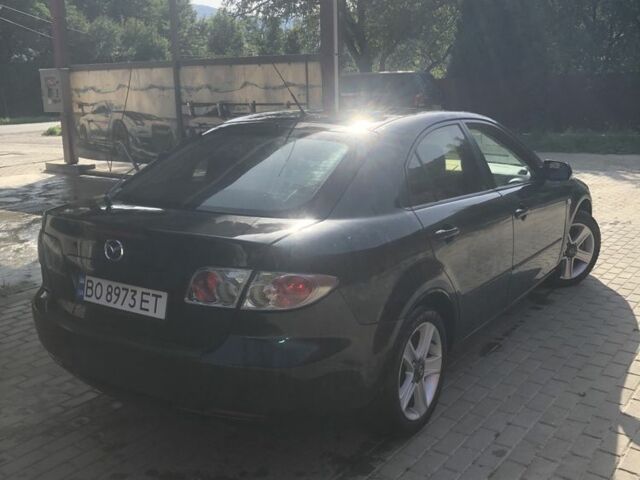 Черный Мазда 6, объемом двигателя 2 л и пробегом 312 тыс. км за 4200 $, фото 4 на Automoto.ua