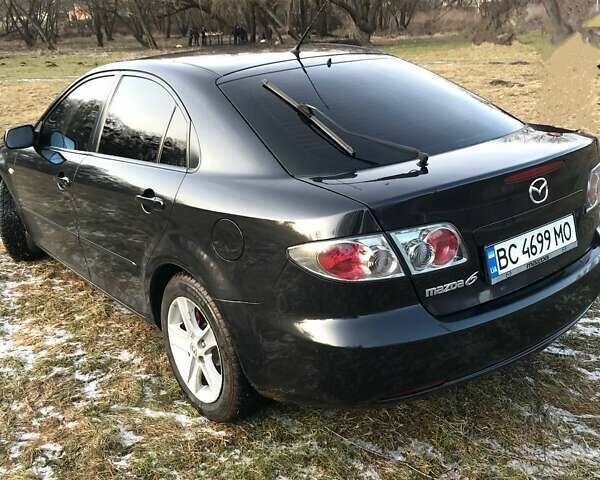 Чорний Мазда 6, об'ємом двигуна 1.8 л та пробігом 217 тис. км за 5700 $, фото 5 на Automoto.ua