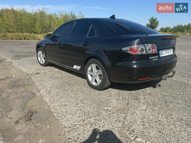 Чорний Мазда 6, об'ємом двигуна 2 л та пробігом 366 тис. км за 3800 $, фото 2 на Automoto.ua