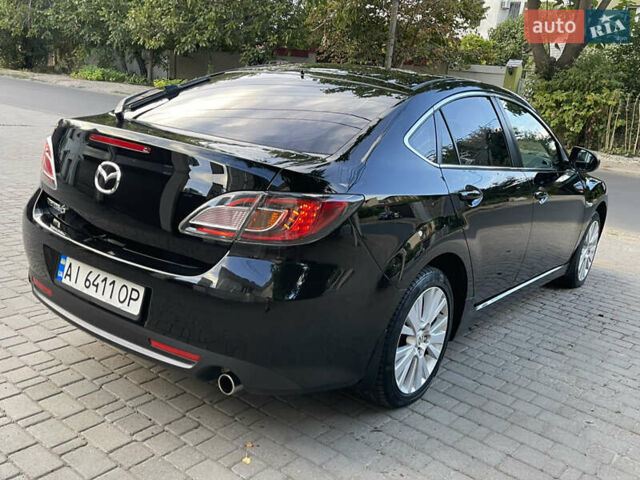 Черный Мазда 6, объемом двигателя 1.8 л и пробегом 245 тыс. км за 6000 $, фото 5 на Automoto.ua