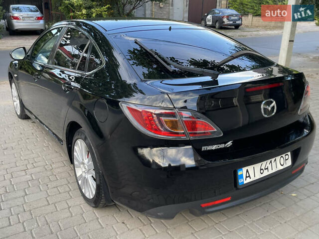 Черный Мазда 6, объемом двигателя 1.8 л и пробегом 245 тыс. км за 6000 $, фото 6 на Automoto.ua