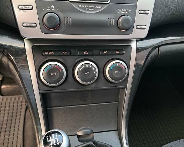 Черный Мазда 6, объемом двигателя 2 л и пробегом 184 тыс. км за 6900 $, фото 27 на Automoto.ua
