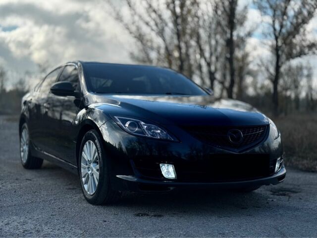 Черный Мазда 6, объемом двигателя 2 л и пробегом 199 тыс. км за 6500 $, фото 1 на Automoto.ua