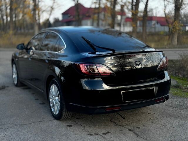 Черный Мазда 6, объемом двигателя 2 л и пробегом 199 тыс. км за 6500 $, фото 4 на Automoto.ua