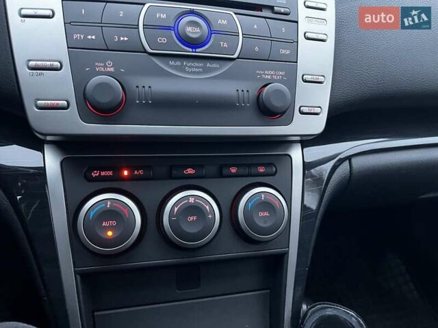 Черный Мазда 6, объемом двигателя 2 л и пробегом 173 тыс. км за 8100 $, фото 44 на Automoto.ua