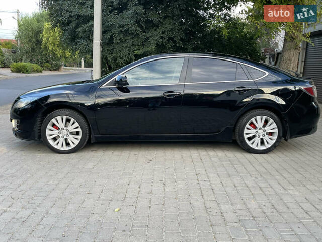 Черный Мазда 6, объемом двигателя 1.8 л и пробегом 245 тыс. км за 6000 $, фото 3 на Automoto.ua