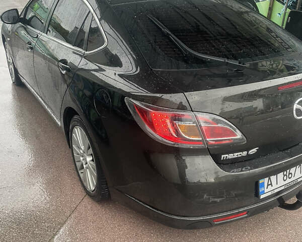 Черный Мазда 6, объемом двигателя 2 л и пробегом 274 тыс. км за 7200 $, фото 4 на Automoto.ua