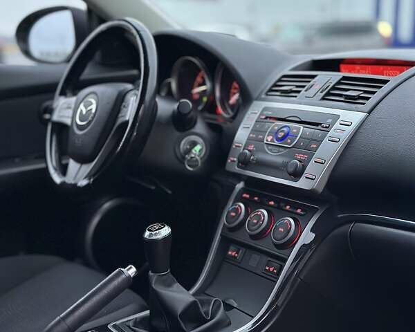 Чорний Мазда 6, об'ємом двигуна 1.8 л та пробігом 248 тис. км за 6299 $, фото 12 на Automoto.ua