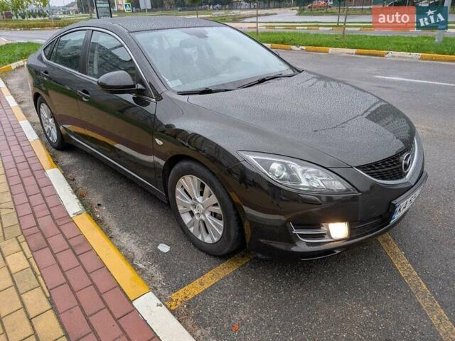 Черный Мазда 6, объемом двигателя 2 л и пробегом 197 тыс. км за 8000 $, фото 1 на Automoto.ua