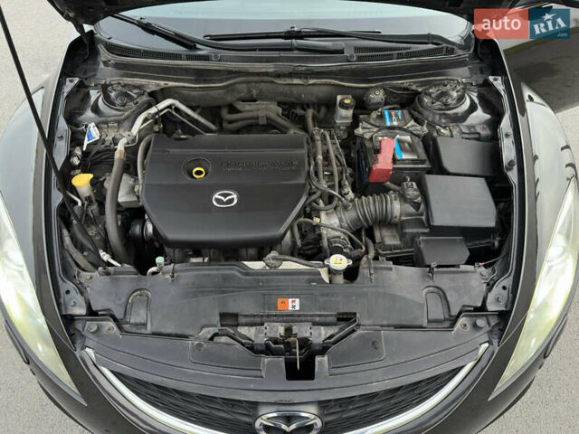 Чорний Мазда 6, об'ємом двигуна 2 л та пробігом 235 тис. км за 7399 $, фото 23 на Automoto.ua