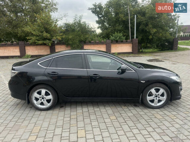 Черный Мазда 6, объемом двигателя 2.2 л и пробегом 258 тыс. км за 7500 $, фото 1 на Automoto.ua