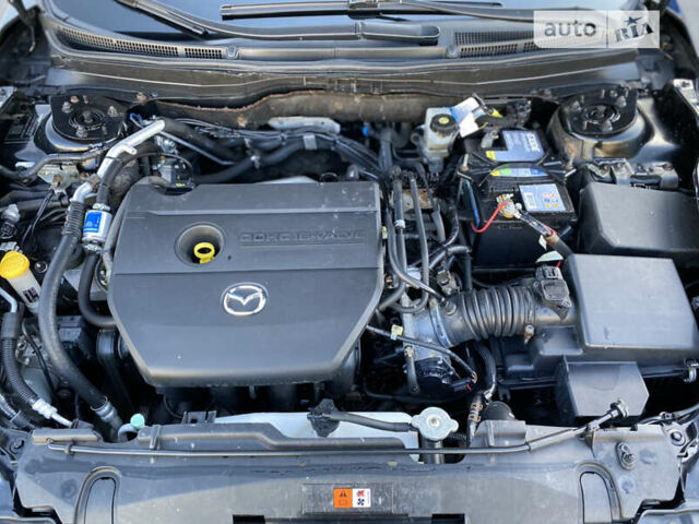 Черный Мазда 6, объемом двигателя 1.8 л и пробегом 184 тыс. км за 7100 $, фото 14 на Automoto.ua