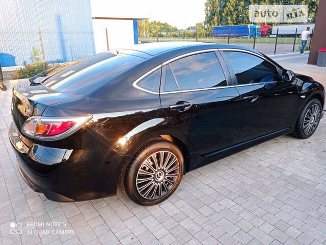 Черный Мазда 6, объемом двигателя 1.8 л и пробегом 184 тыс. км за 7100 $, фото 32 на Automoto.ua
