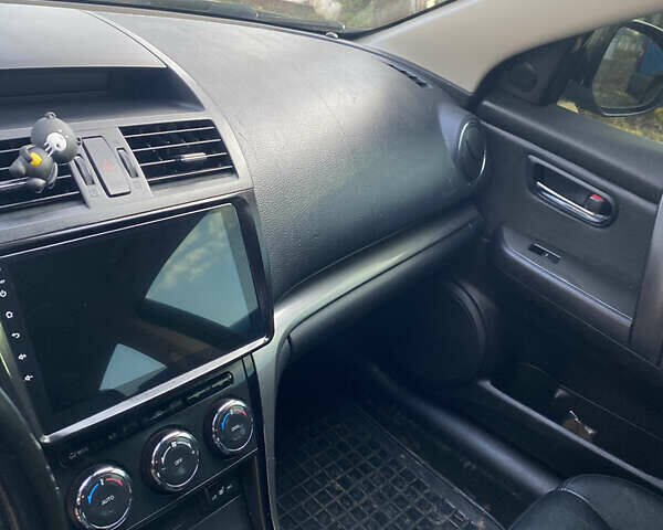 Черный Мазда 6, объемом двигателя 2.18 л и пробегом 270 тыс. км за 7800 $, фото 9 на Automoto.ua