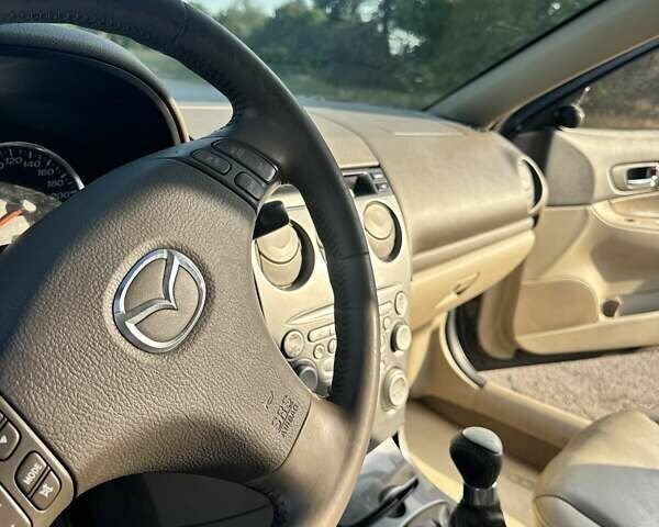 Фиолетовый Мазда 6, объемом двигателя 2 л и пробегом 304 тыс. км за 3000 $, фото 8 на Automoto.ua