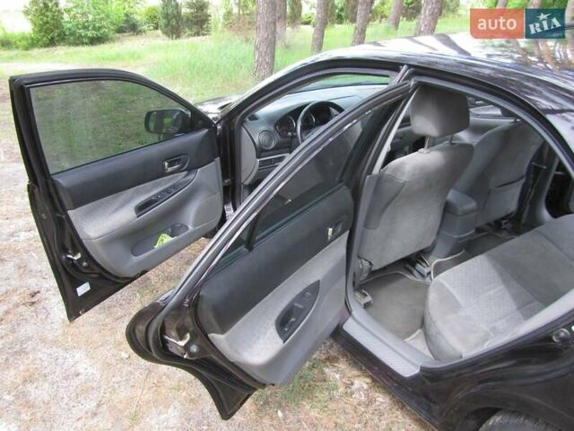 Фиолетовый Мазда 6, объемом двигателя 1.8 л и пробегом 275 тыс. км за 4800 $, фото 9 на Automoto.ua