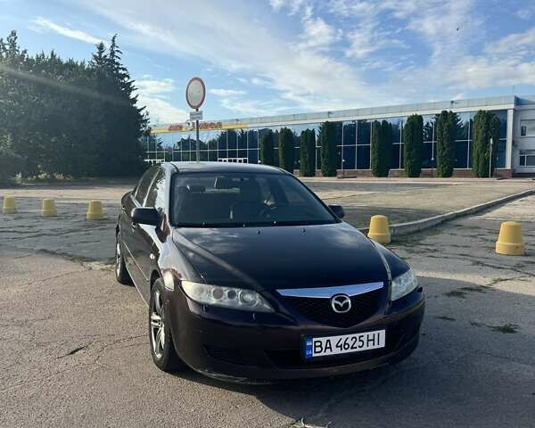 Фиолетовый Мазда 6, объемом двигателя 2 л и пробегом 304 тыс. км за 3300 $, фото 1 на Automoto.ua