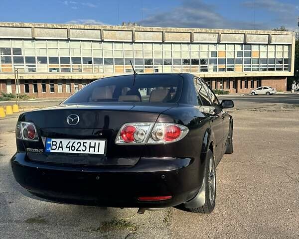 Фиолетовый Мазда 6, объемом двигателя 2 л и пробегом 304 тыс. км за 3300 $, фото 4 на Automoto.ua