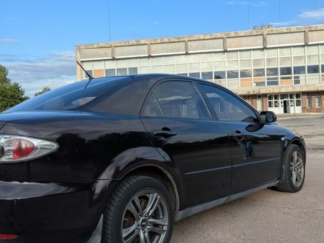 Фіолетовий Мазда 6, об'ємом двигуна 2 л та пробігом 304 тис. км за 2940 $, фото 1 на Automoto.ua