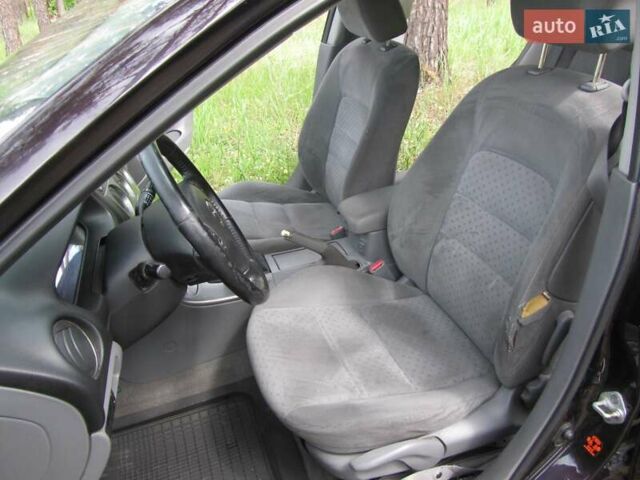 Фиолетовый Мазда 6, объемом двигателя 1.8 л и пробегом 275 тыс. км за 4800 $, фото 6 на Automoto.ua