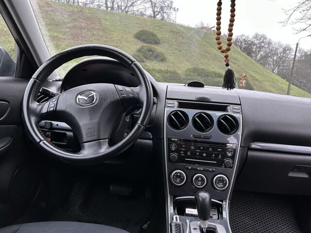 Фиолетовый Мазда 6, объемом двигателя 2 л и пробегом 318 тыс. км за 4000 $, фото 10 на Automoto.ua