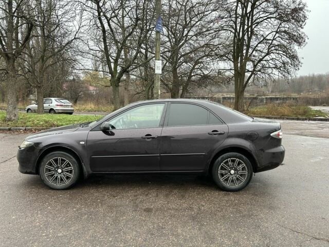 Фиолетовый Мазда 6, объемом двигателя 2 л и пробегом 318 тыс. км за 4000 $, фото 3 на Automoto.ua