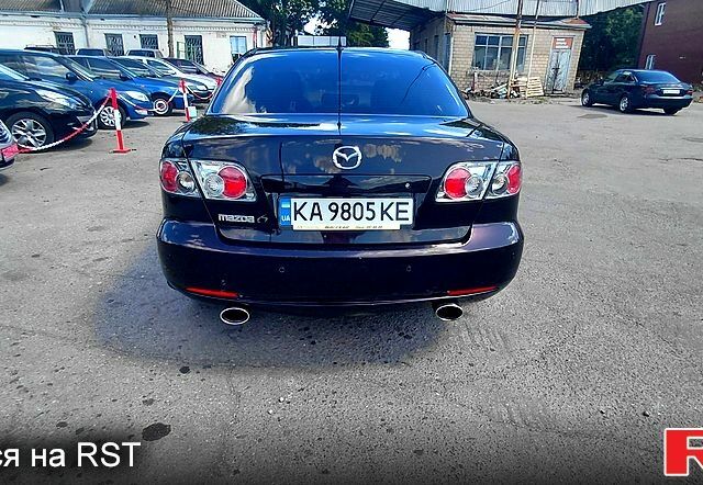 Фиолетовый Мазда 6, объемом двигателя 2 л и пробегом 236 тыс. км за 3400 $, фото 1 на Automoto.ua