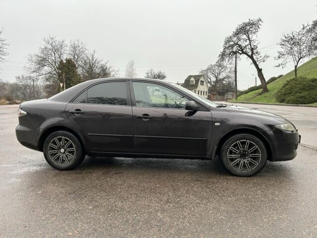 Фиолетовый Мазда 6, объемом двигателя 2 л и пробегом 318 тыс. км за 4000 $, фото 6 на Automoto.ua