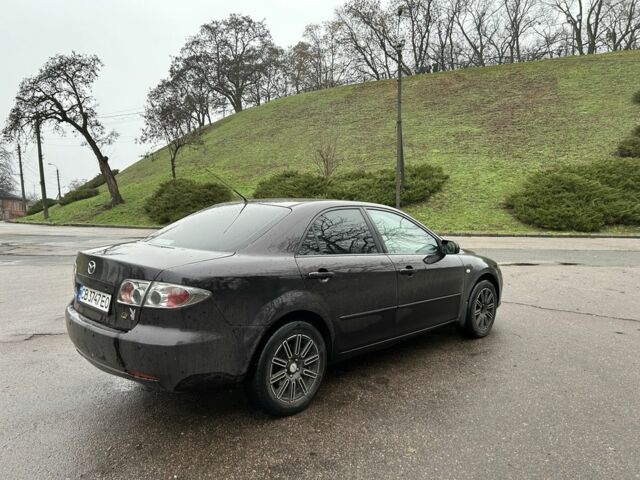 Фиолетовый Мазда 6, объемом двигателя 2 л и пробегом 318 тыс. км за 4000 $, фото 7 на Automoto.ua