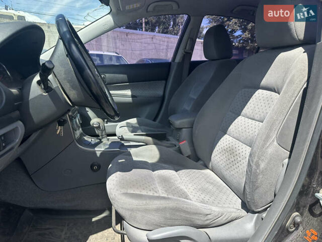 Фиолетовый Мазда 6, объемом двигателя 2 л и пробегом 190 тыс. км за 3800 $, фото 6 на Automoto.ua