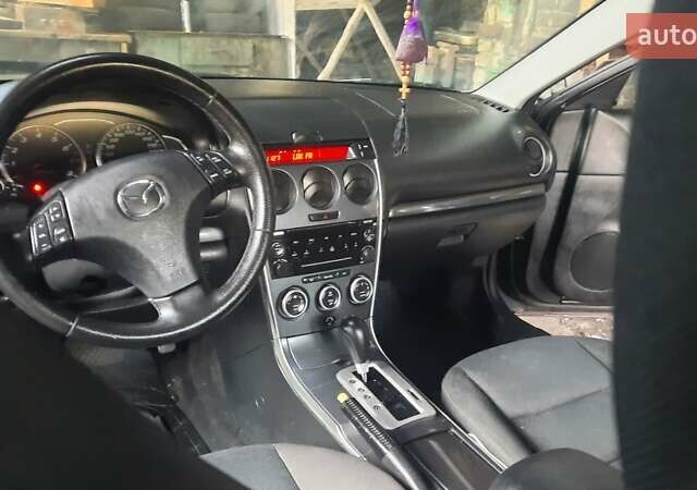 Фиолетовый Мазда 6, объемом двигателя 2 л и пробегом 200 тыс. км за 5200 $, фото 21 на Automoto.ua
