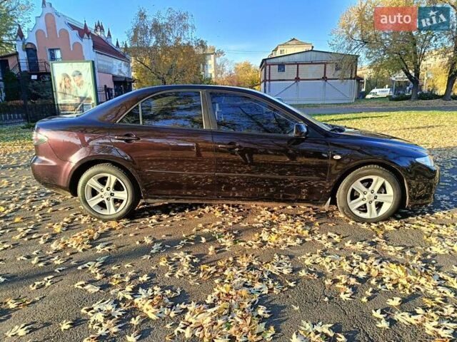 Фиолетовый Мазда 6, объемом двигателя 2 л и пробегом 190 тыс. км за 4950 $, фото 2 на Automoto.ua