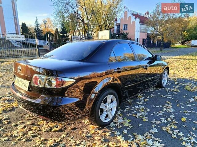 Фиолетовый Мазда 6, объемом двигателя 2 л и пробегом 190 тыс. км за 4950 $, фото 7 на Automoto.ua